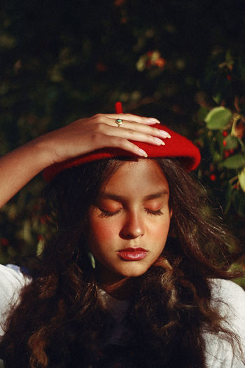 Close-up teenage girl wearing beret