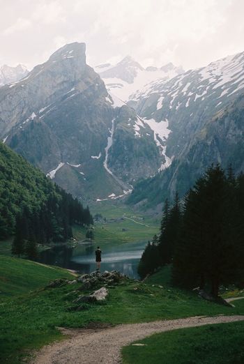 Scenic view of snowcapped mountains against sky