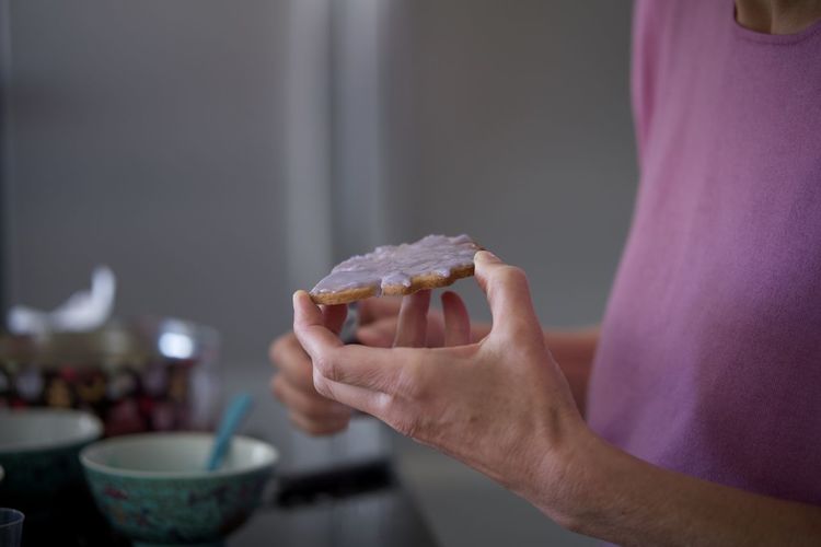 Close-up of hand holding cookie