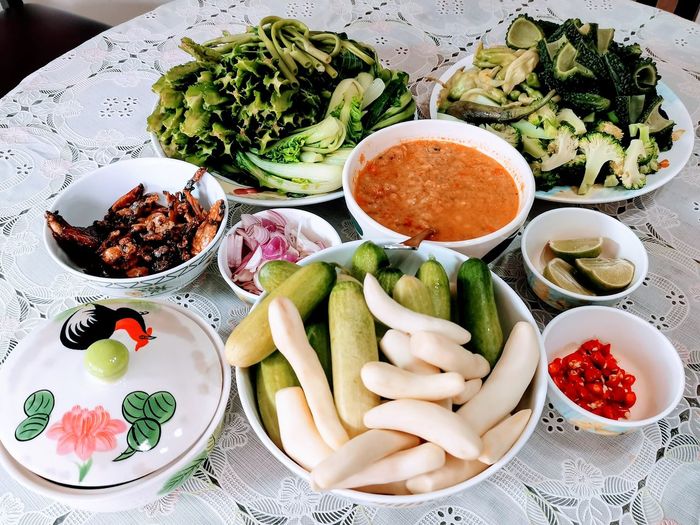 High angle view of chopped vegetables in bowl on table