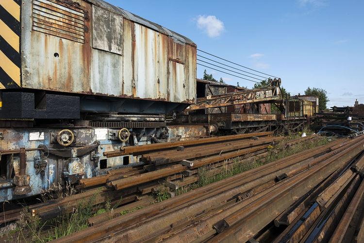 Disused rail tracks and rolling stock.