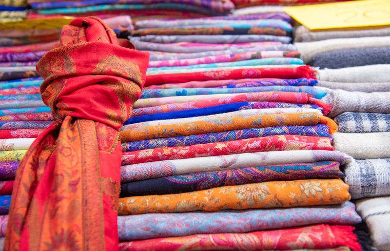 Close-up of multi colored displayed for sale at market stall