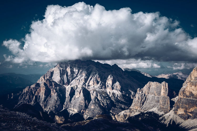 Big cloud over cunturines peak , cortina d'ampezzo, dolomites unesco