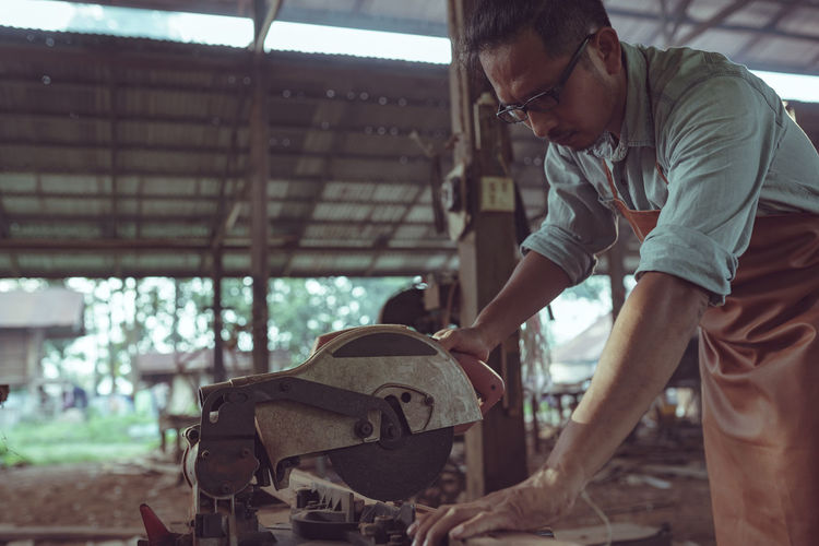 Side view of a man working