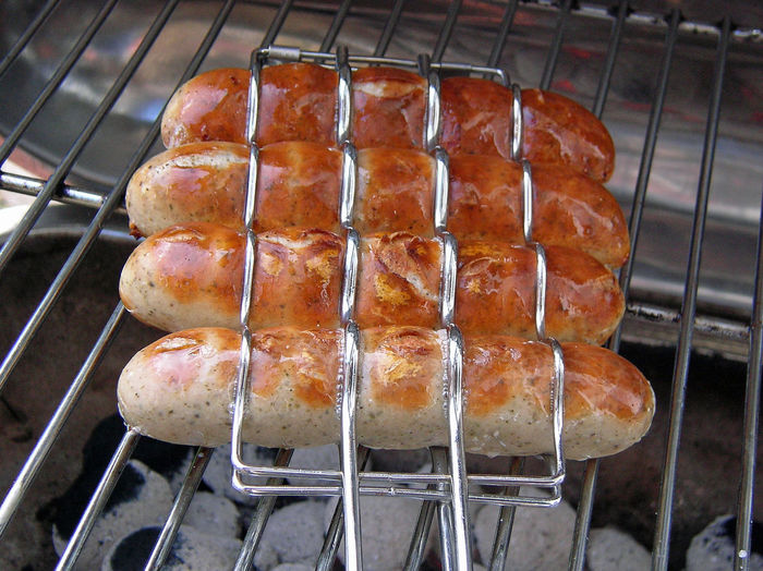 Close-up of sausages on grill
