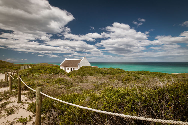 Scenic view of old cape dutch style house at de hoop nature reserve, south africa