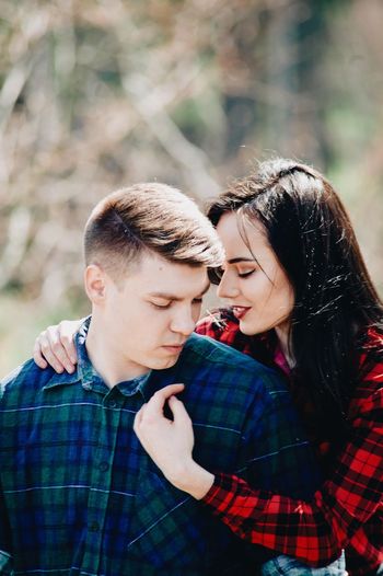 Loving young couple in forest