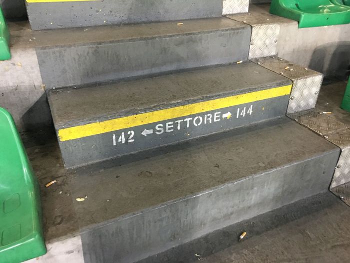 High angle view of yellow text on street