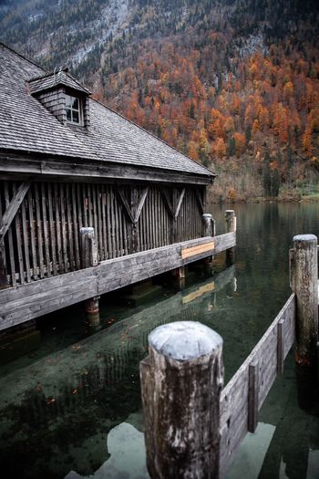 Wooden bridge over lake during autumn