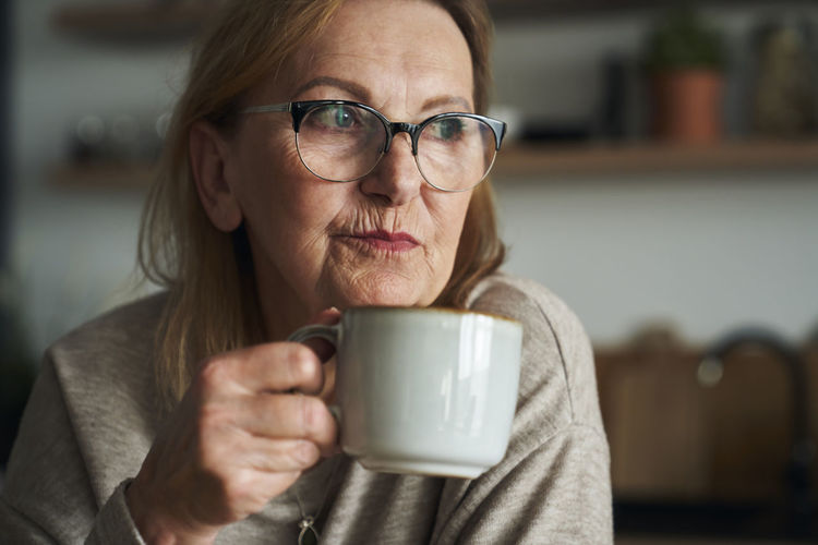 Close-up of woman using mobile phone