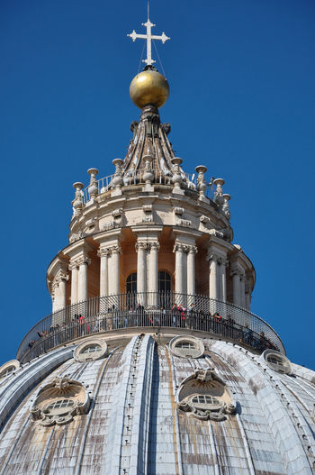 Cupola of the saint peter's basilica in vatican city with majestic views above the city of rome