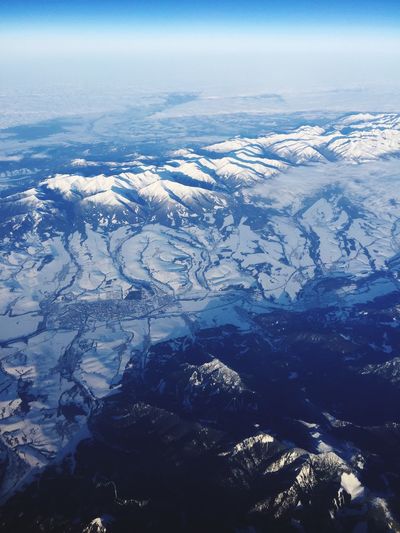 Aerial view of snow covered landscape