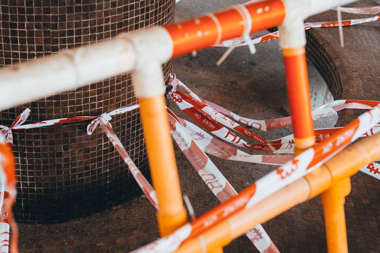 Close-up of orange plastic pipes