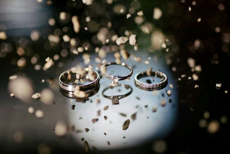 Close-up of finger rings on table