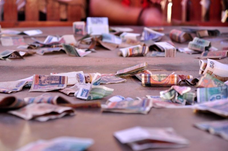 Close-up of currency on table