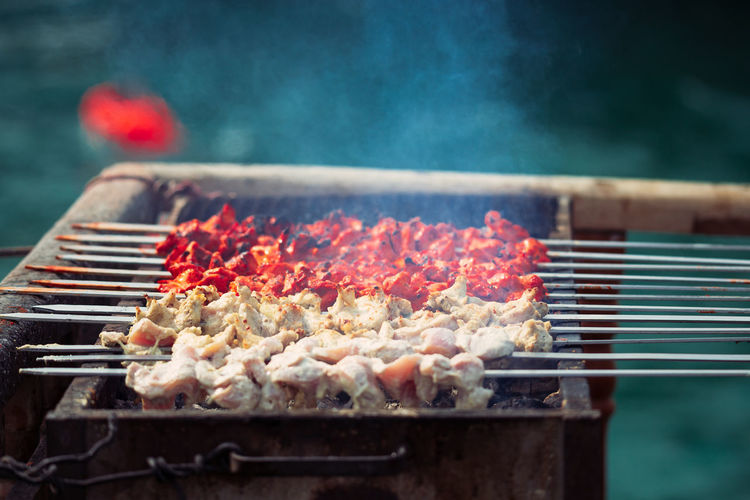 Close-up of meat on barbecue grill