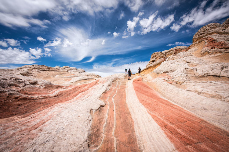 White Pockets in The Vermillion Cliffs National Monument is truly otherworldly. The brain rock and waves of sandstone create one of the most unique terrains imaginable. White Pocket, Arizona Activity Arid Climate Beauty In Nature Climate Cloud - Sky Day Environment Land Landscape Leisure Activity Lifestyles Mountain Nature Non-urban Scene One Person Outdoors Real People Rear View Scenics - Nature Sky Tranquil Scene Tranquility The Great Outdoors - 2018 EyeEm Awards