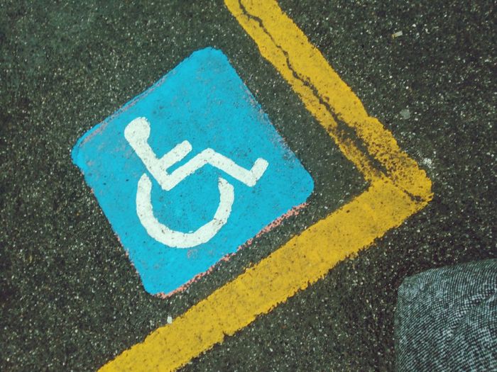 High angle view of disabled sign on street