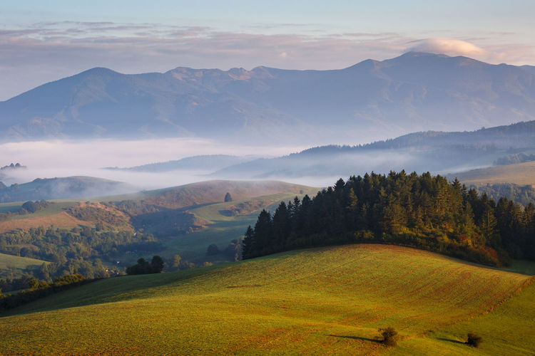 Fog in the valley of turiec region and view of mala fatra.