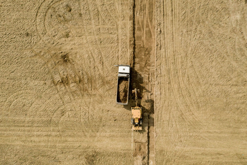 Aerial view of tractor working at farm