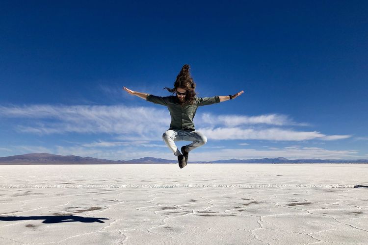 Man jumping in desert