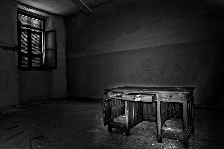 Empty chairs in old room