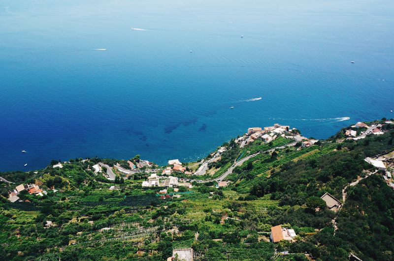 High angle view of town by sea at amalfi coast