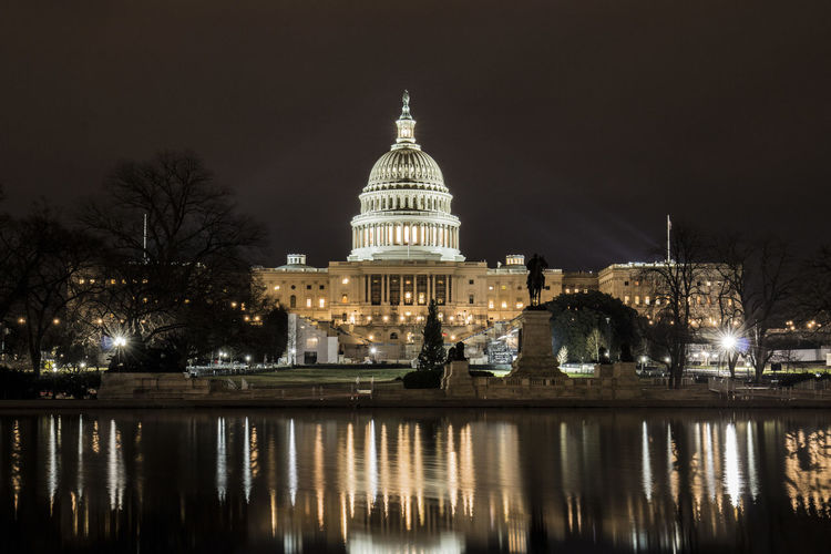 United states capitol building lit up at night