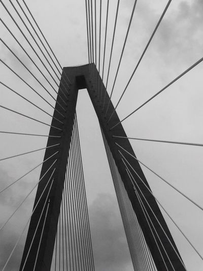 Low angle view of cooper river bridge against sky