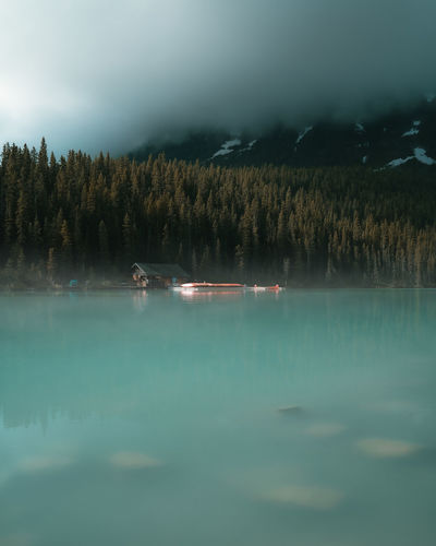 Scenic and foggy view of lake louie, canada