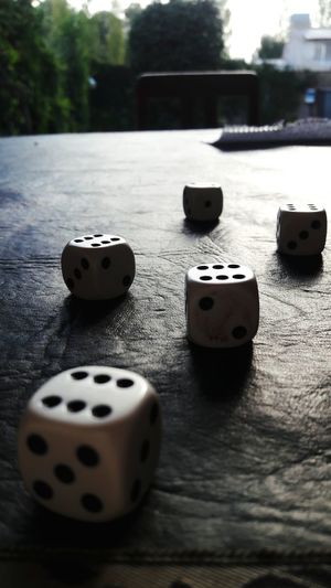 Close-up of dices on table