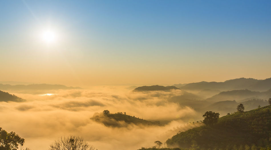 Scenic view of mountains against sky during sunset
