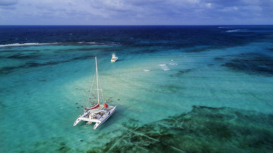 High angle view of sailboat in sea against sky