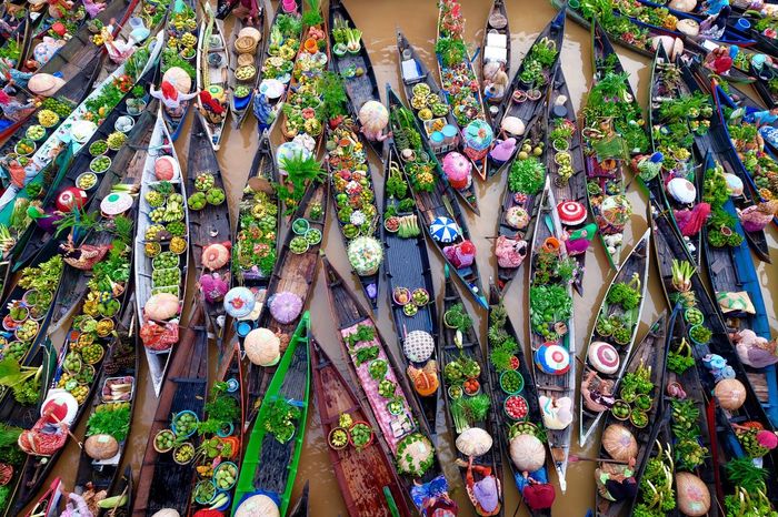 High angle view of boats selling vegetables