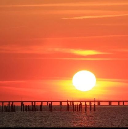 Scenic view of sea at sunset