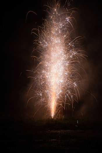 Firework display at night