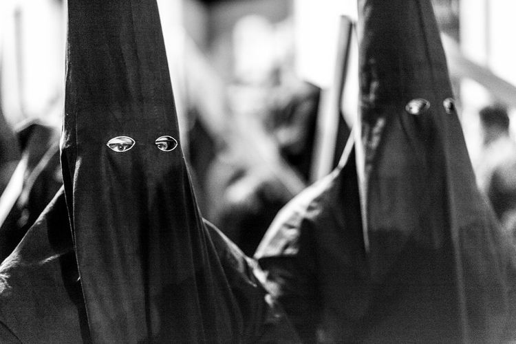 Masked people at holy week processions