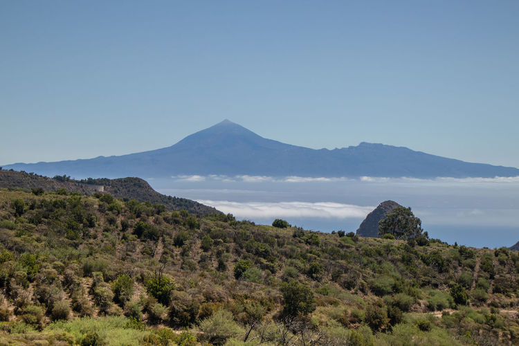 Scenic view of mountains against clear sky