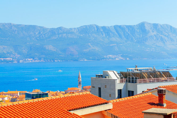 Tilled roofs of budva town in montenegro . city situated at the adriatic sea coast