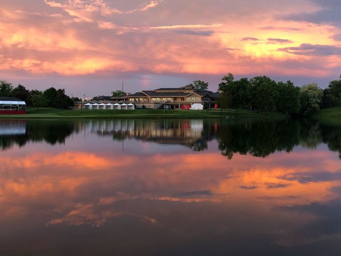 Scenic view of lake against sky during sunset