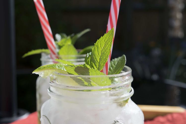 Close-up of mojito in mason jars