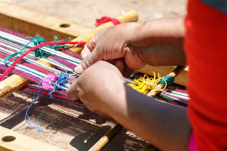 Cropped image of hands knitting