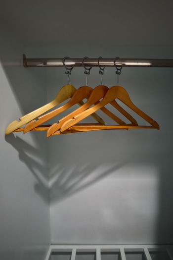 Close-up of empty clothes hanging on rack