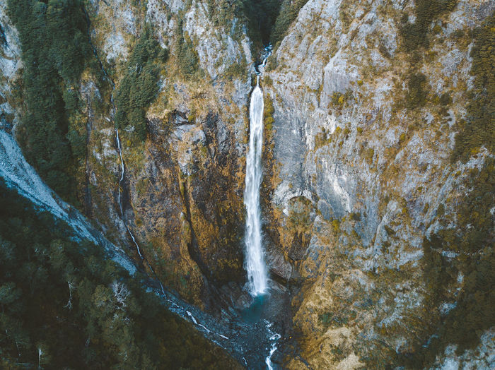 Close-up of waterfall against rock formation