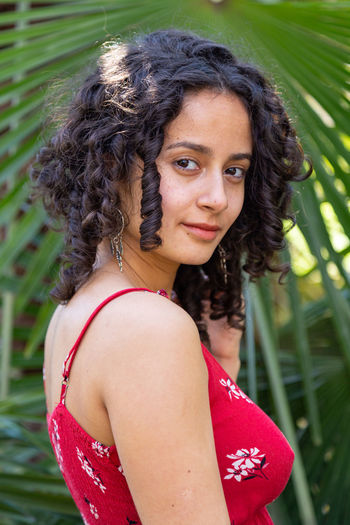 Portrait of young woman looking away