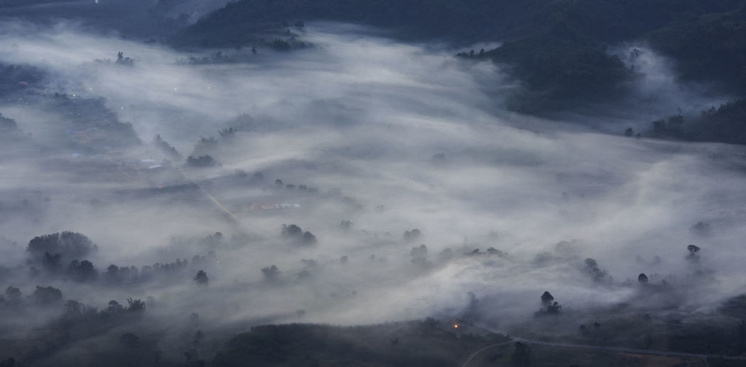 Low angle view of fog against sky