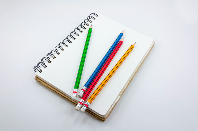 High angle view of felt tip pens on white background