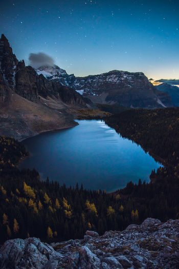 Cerulean lake in mount assiniboine provincial park, british columbia, canada after sunset