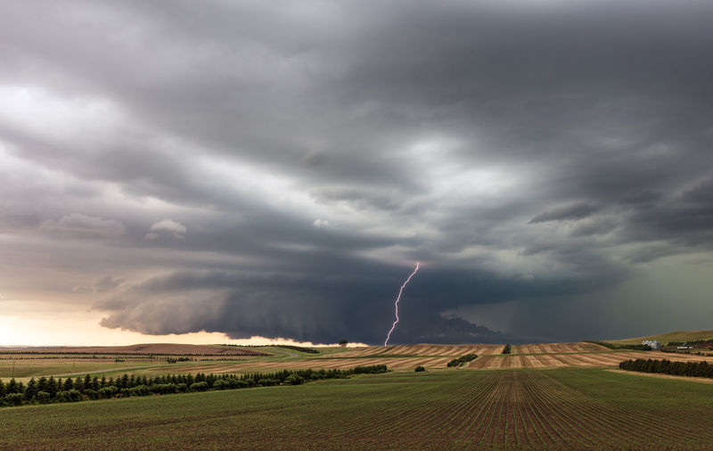 Supercell thunderstorm with wall cloud and lightning near linton, north dakota