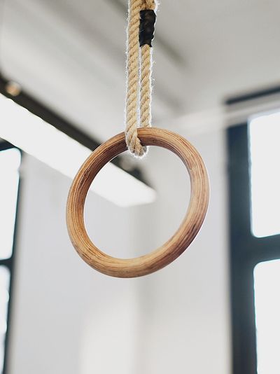 Low angle view of tied hanging on rope